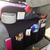 Органайзер для автокресла от IKEA Flort в деле. Фото с сайта theoddmomout.com