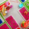 Ковер-кукольный домик для маленькой детской комнаты Play House Pink Rug. Фото с сайта Giggle.com
